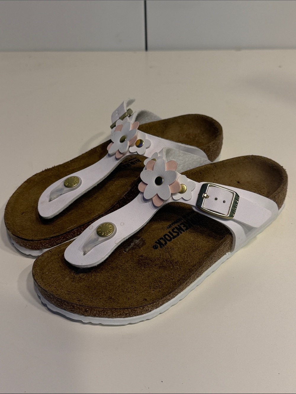 Birkenstock White Floral Toe-Post Sandals with Gold Buckle